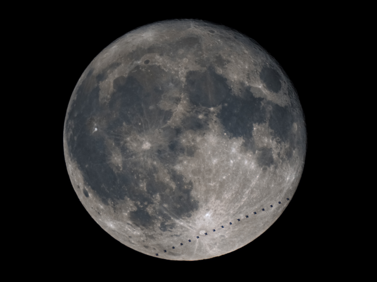 An ISS Transit in front of the moon. Looks like a dotline. Please tear off here.